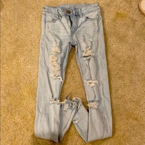 light blue ripped jeans